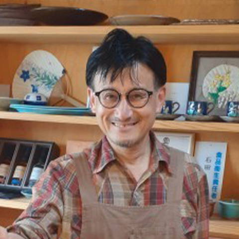 石田 泰久 氏