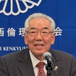 石田 哲雄 氏