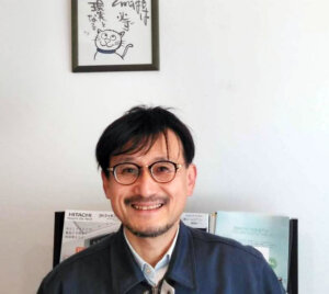 石田 哲雄氏